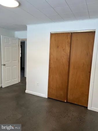 an empty room with closet