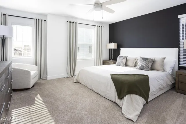 a close up of a sink and a window in an empty room