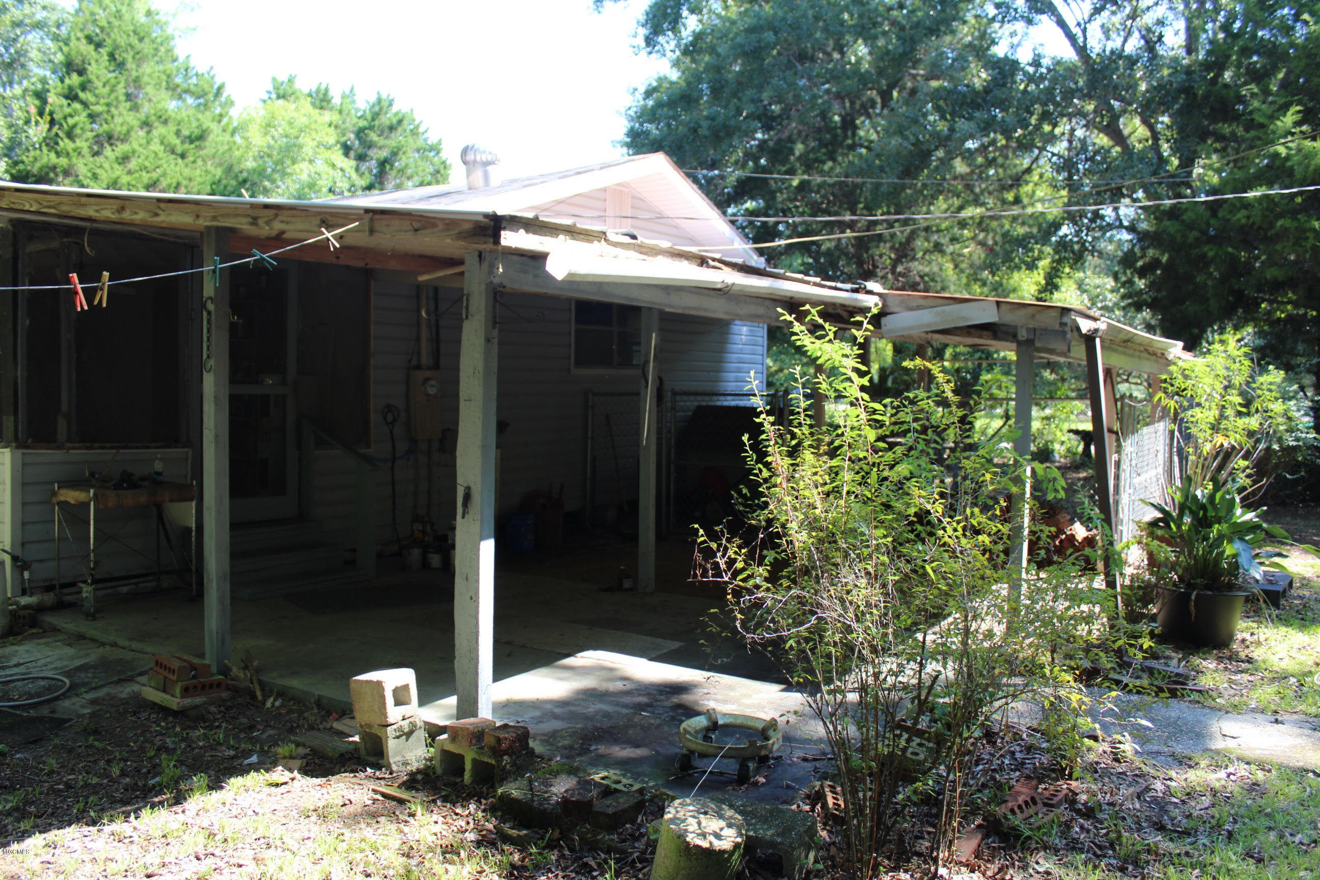 529 Pear Street Ocean Springs, MS 39564 - Photo 14 of 16 529 Pear carport area