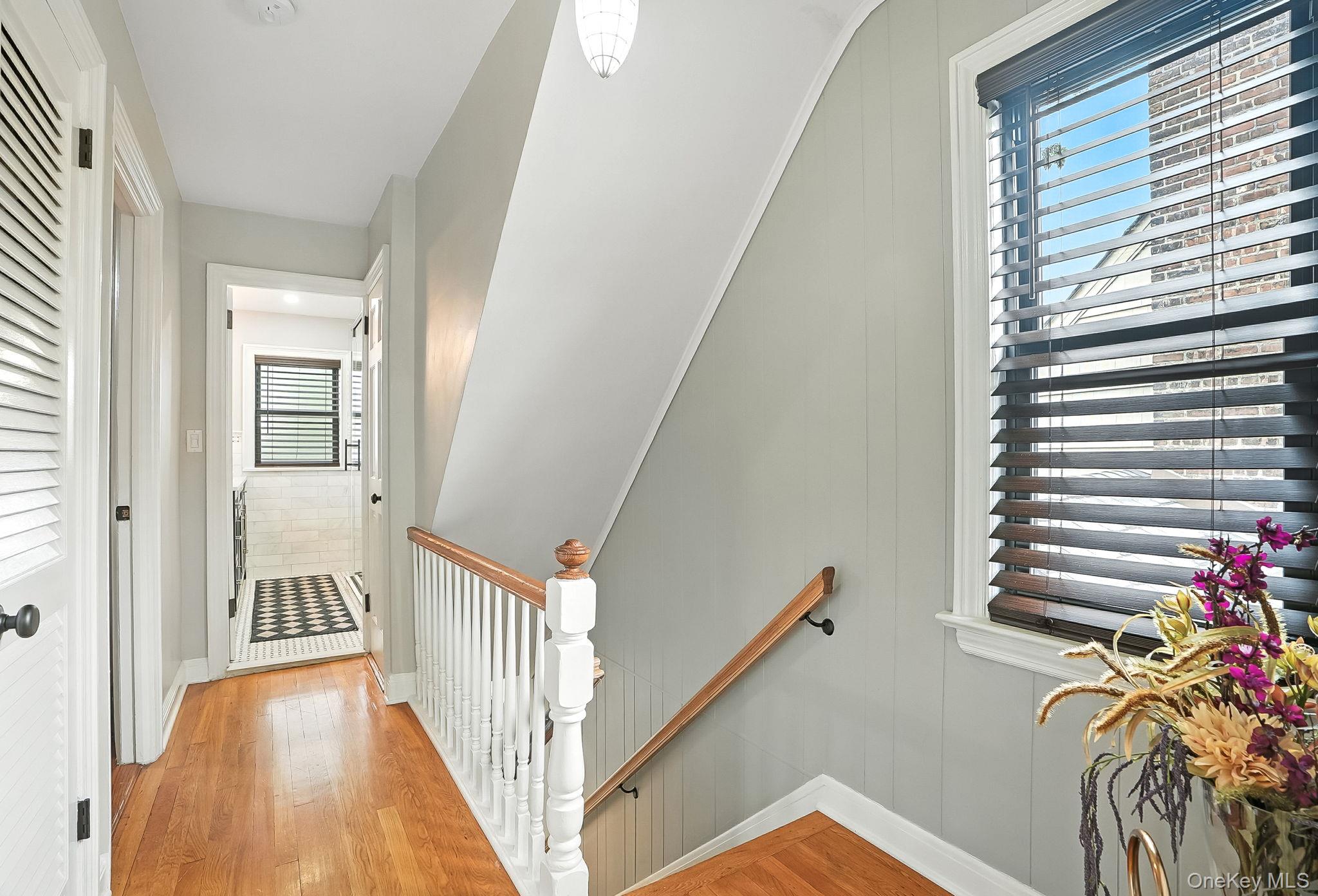 1260 Rhinelander Avenue Bronx, NY 10461 - Photo 18 of 50 Stairs featuring wood finished floors and baseboards