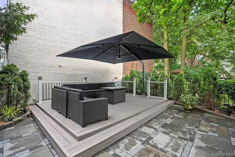 a view of backyard with seating space