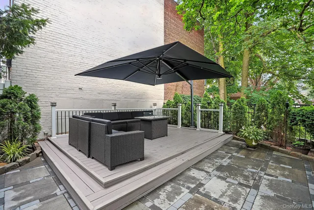 a view of backyard with seating space