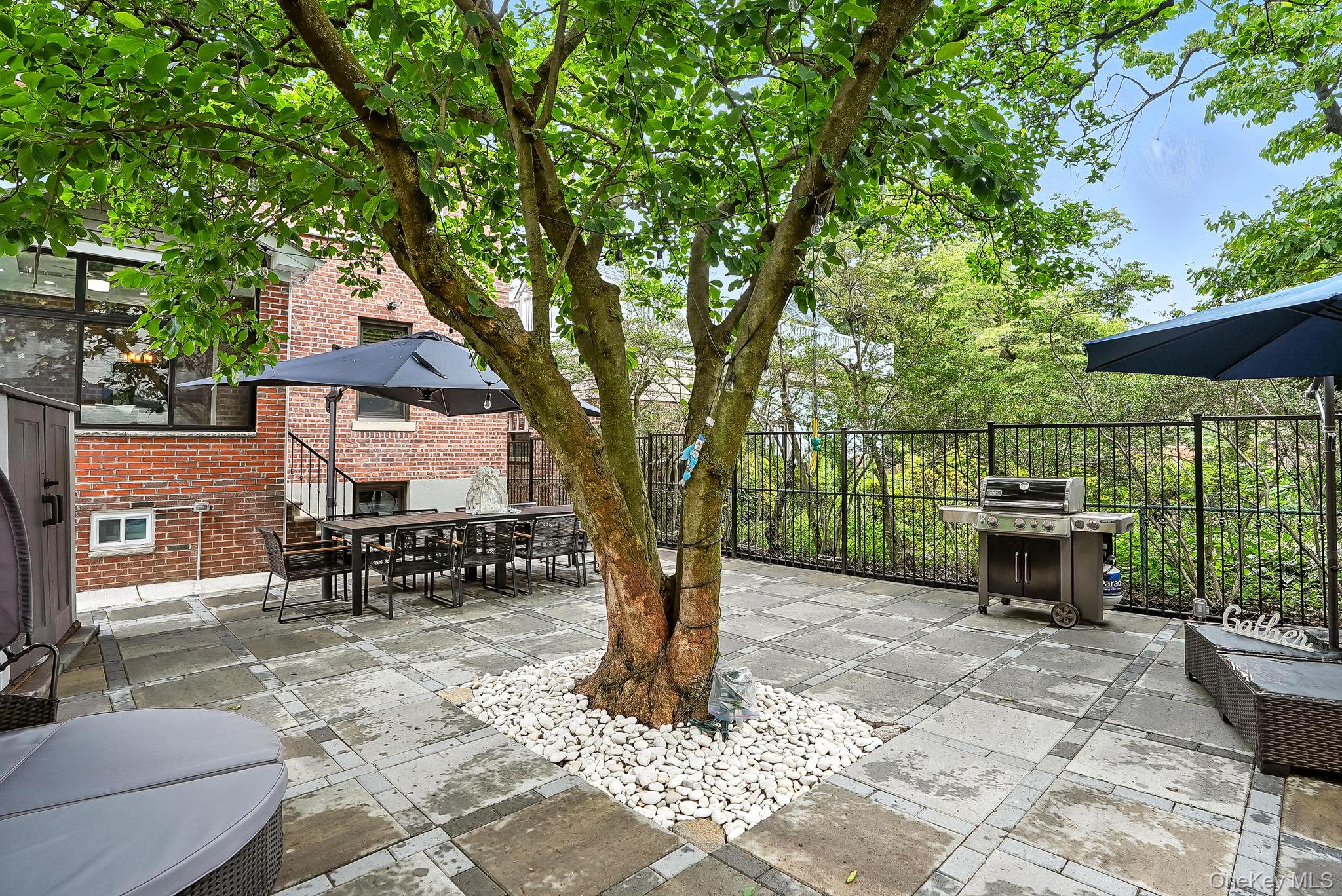 1260 Rhinelander Avenue Bronx, NY 10461 - Photo 41 of 50 View of patio / terrace featuring grilling area and outdoor dining space