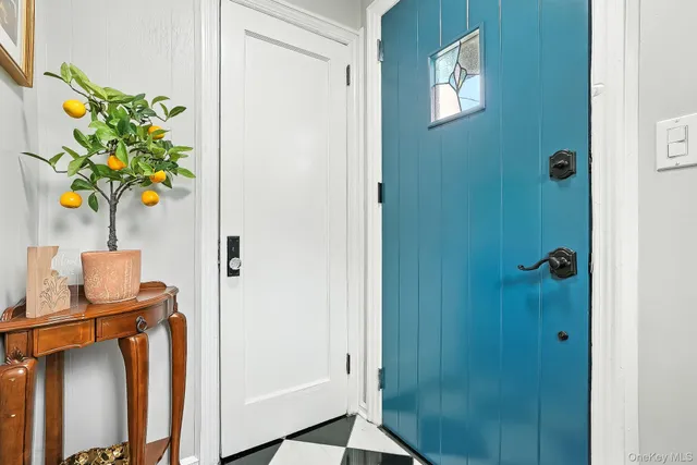 a bathroom with a sink a mirror and a shower