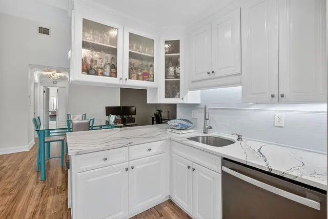 a living room with a couch and a flat screen tv
