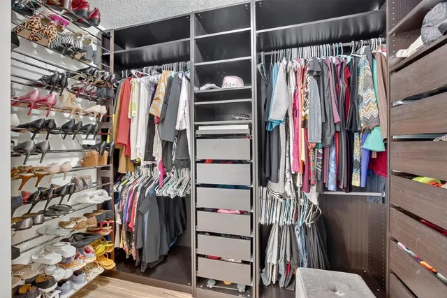 a view of a house with swimming pool and sitting area