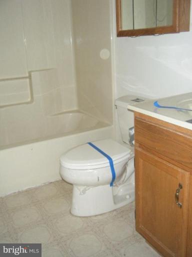 987 Crystal Rock Road Lusby, MD 20657 - Photo 9 of 14 a bathroom with a toilet and a shower