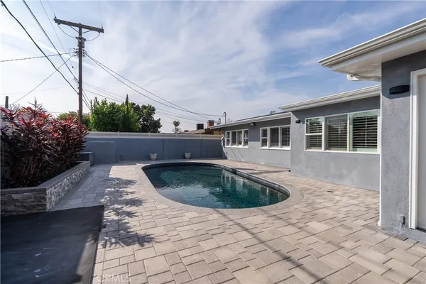 a view of outdoor space yard and swimming pool