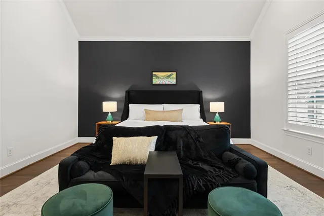 a bed room with a bed and a window