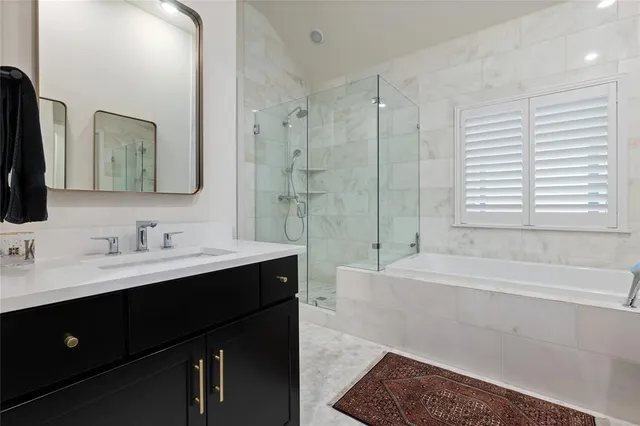 a bed room with a bed and a couch