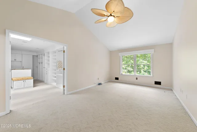 an empty room with a large window