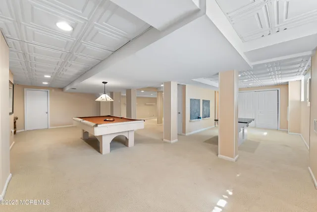 an aerial view of a house with outdoor space and street view