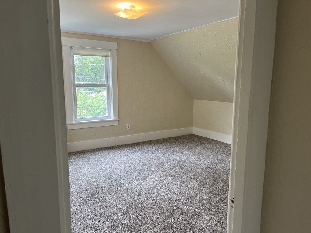 634 Patriots Road Templeton, MA 01468 - Photo 21 of 26 an empty room with windows