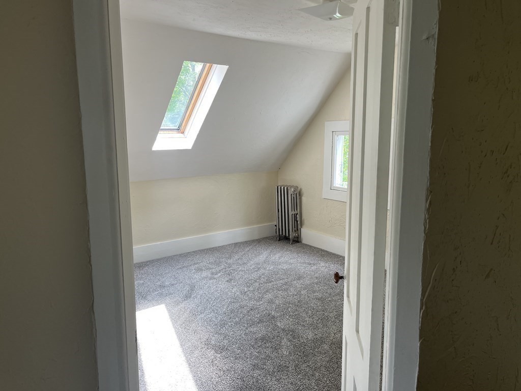 634 Patriots Road Templeton, MA 01468 - Photo 22 of 26 a view of an empty room and window