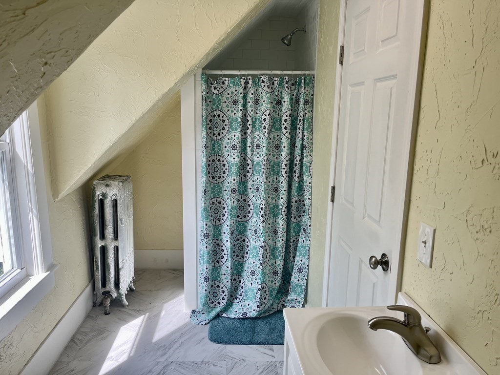 634 Patriots Road Templeton, MA 01468 - Photo 23 of 26 a bathroom with a granite countertop sink and a mirror