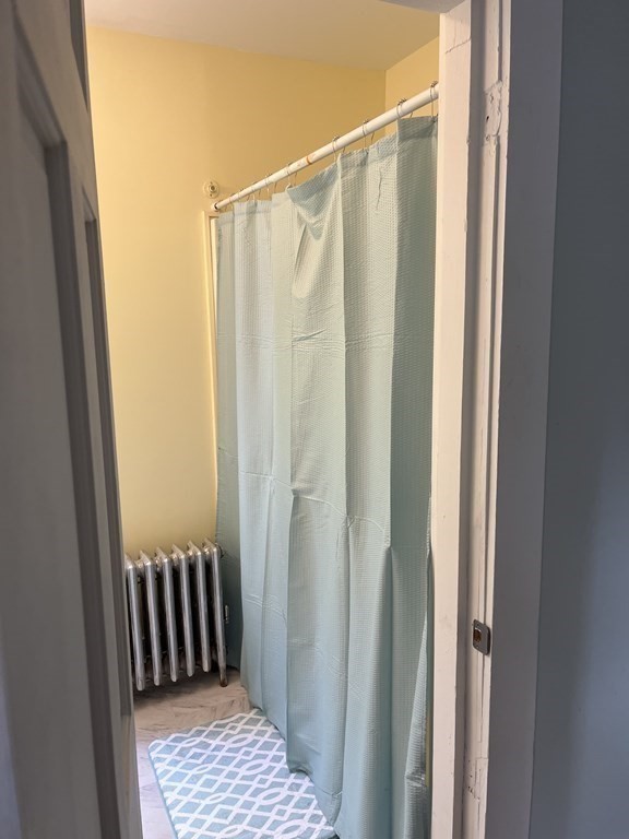 634 Patriots Road Templeton, MA 01468 - Photo 10 of 26 a view of a bathroom from a hallway