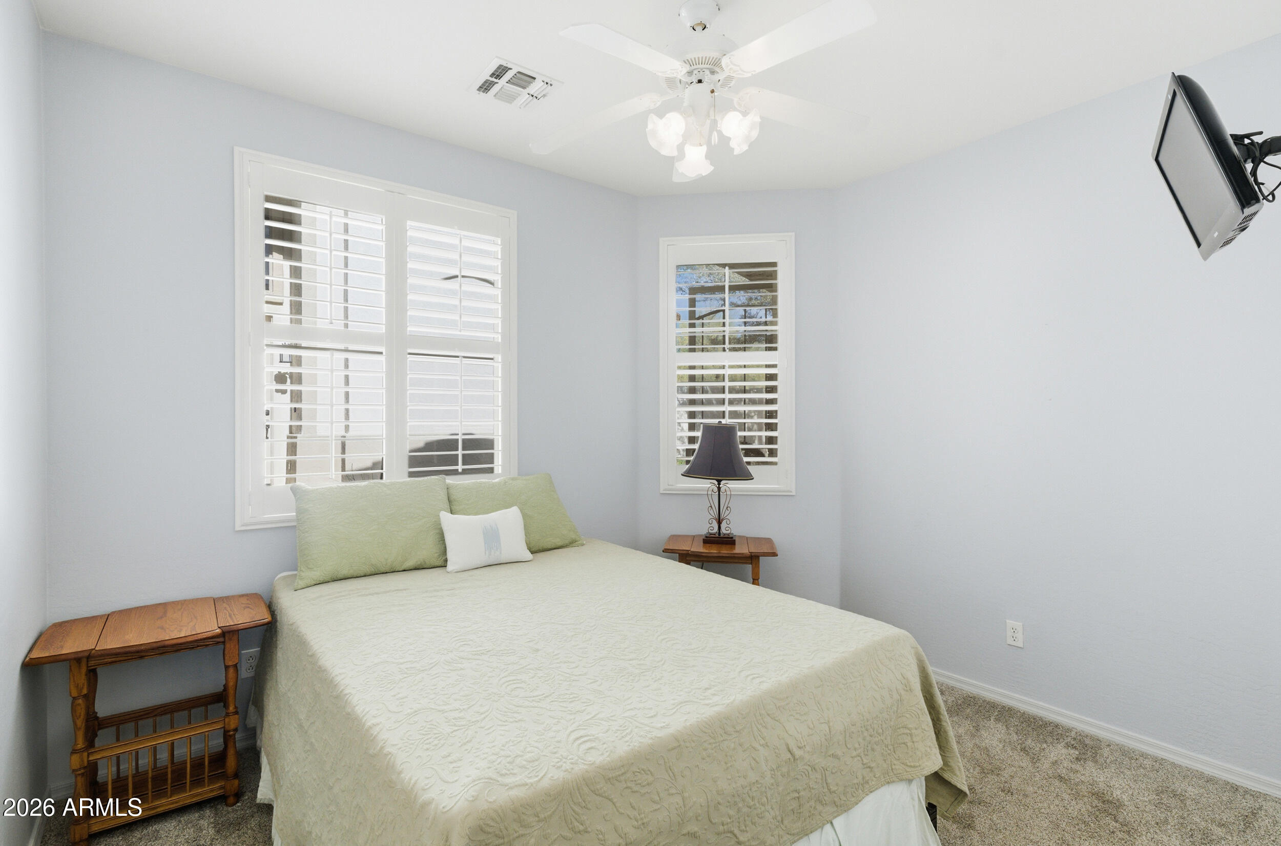 1024 East Frye Road, Unit 1060 Phoenix, AZ 85048 - Photo 12 of 41 a bedroom with a large bed and a window