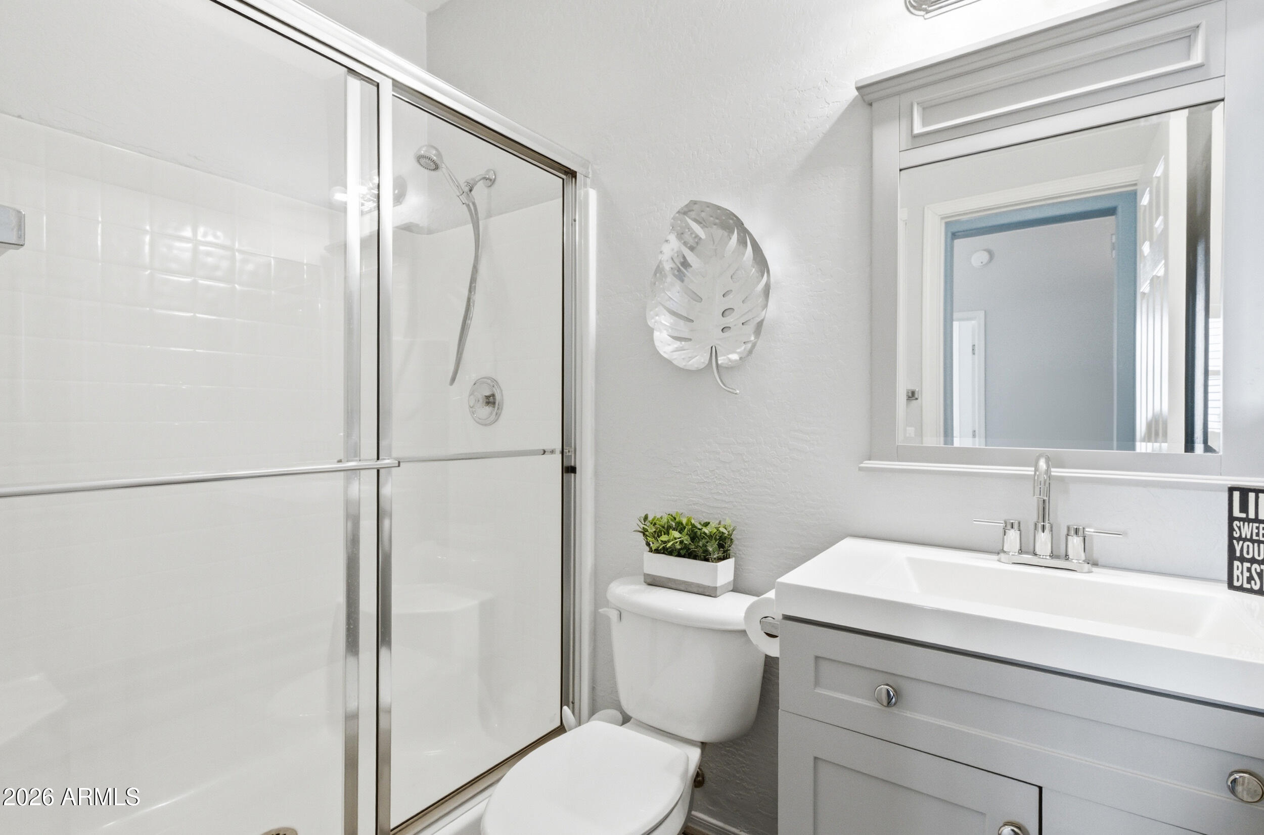 1024 East Frye Road, Unit 1060 Phoenix, AZ 85048 - Photo 14 of 41 a bathroom with a sink toilet and shower