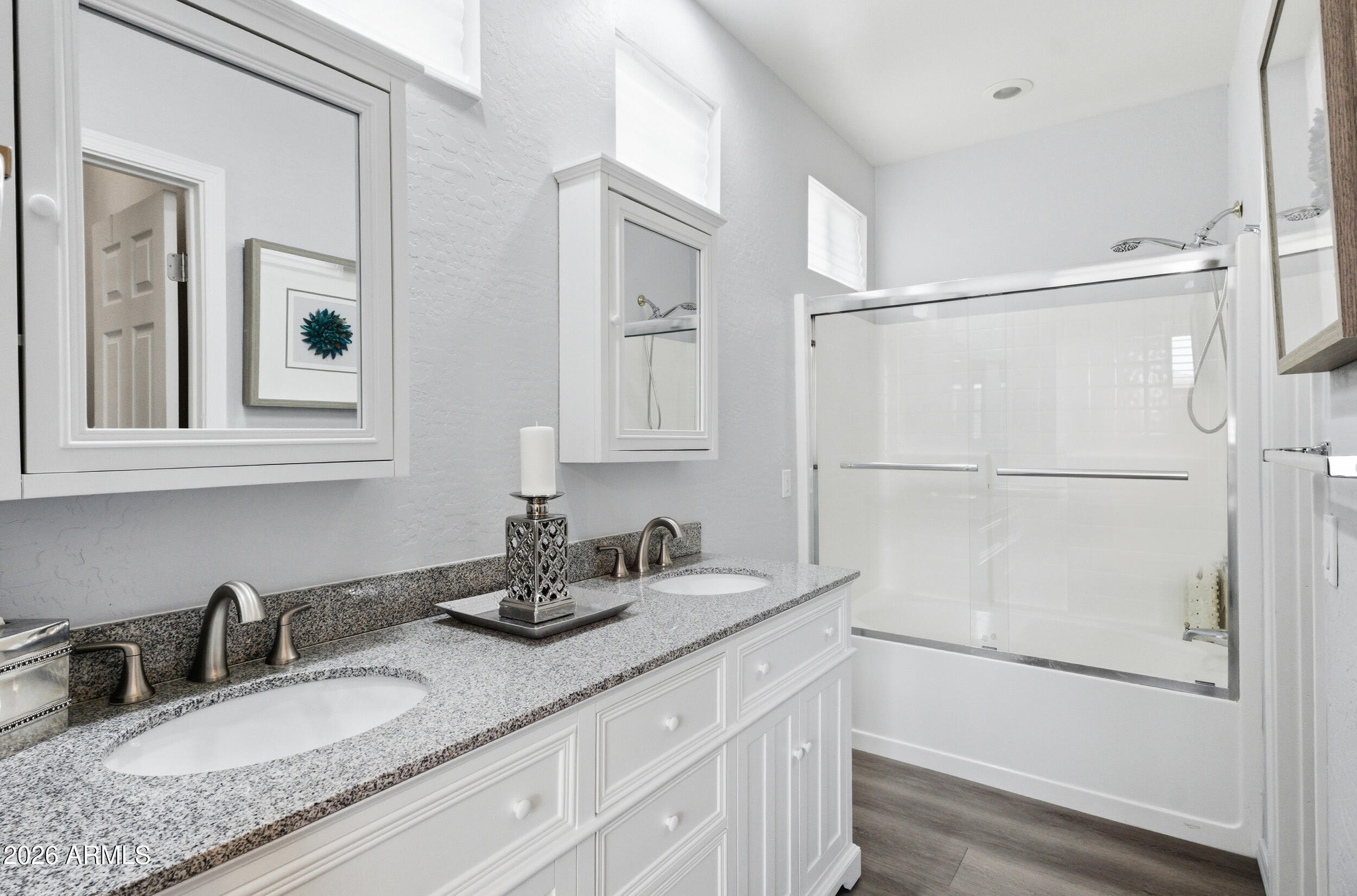 1024 East Frye Road, Unit 1060 Phoenix, AZ 85048 - Photo 18 of 41 a bathroom with a granite countertop sink mirror and vanity