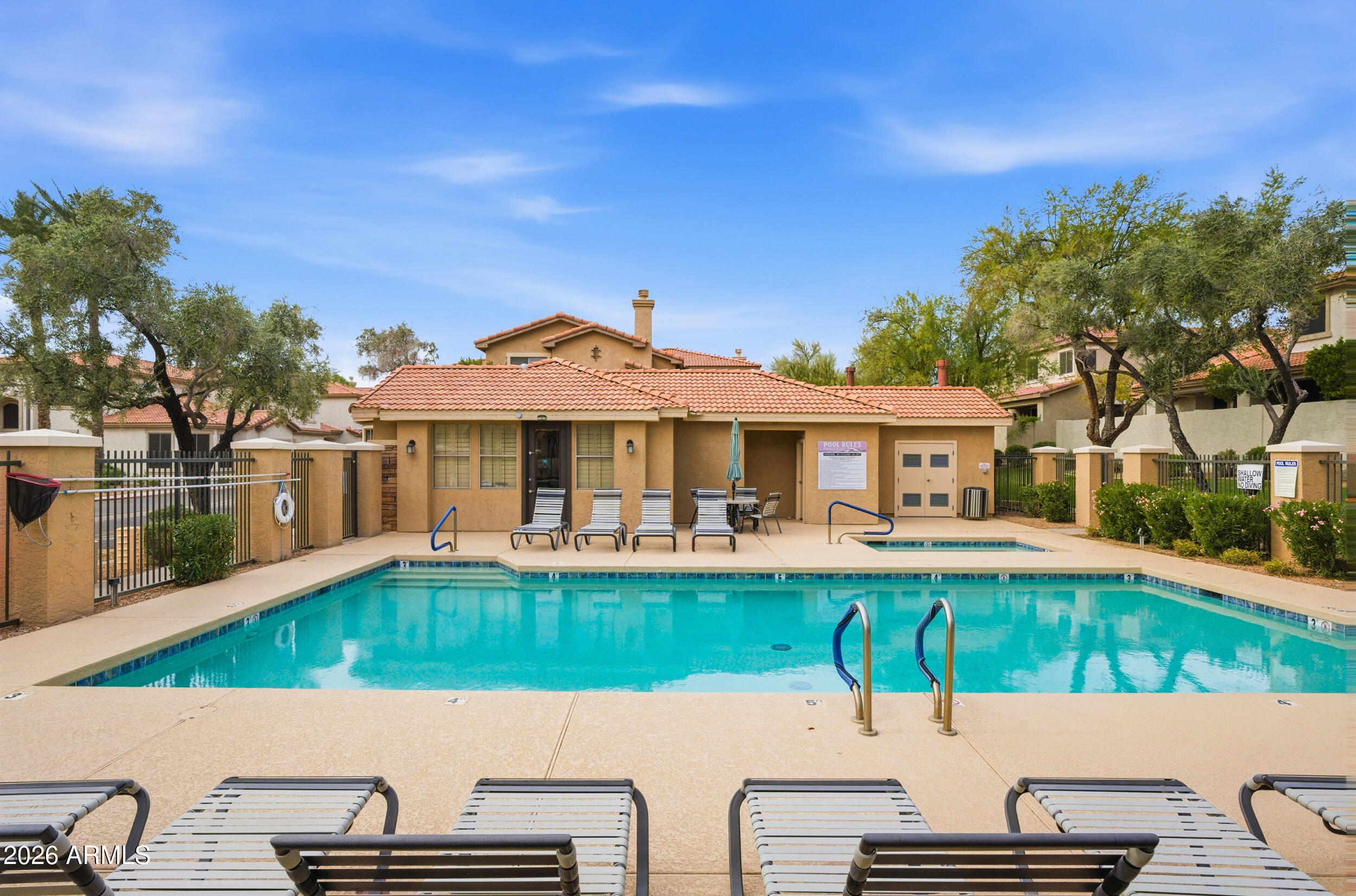 1024 East Frye Road, Unit 1060 Phoenix, AZ 85048 - Photo 29 of 41 a view of a house with pool and chairs