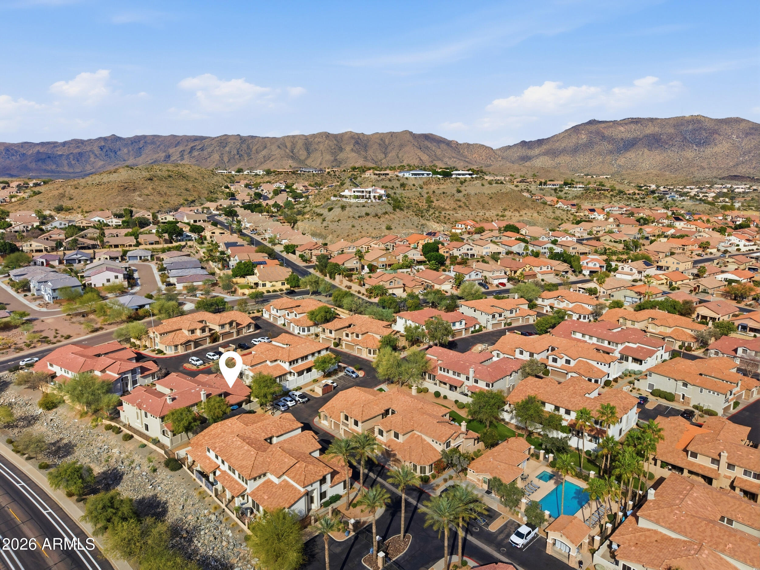 1024 East Frye Road, Unit 1060 Phoenix, AZ 85048 - Photo 37 of 41 an aerial view of residential houses with outdoor space