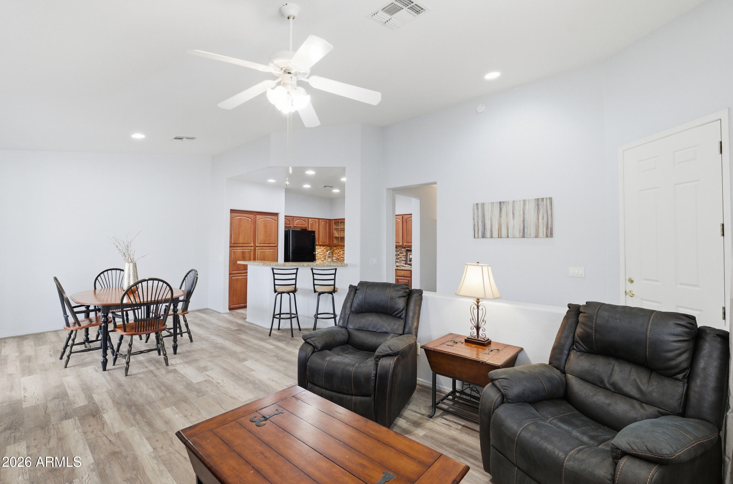 1024 East Frye Road, Unit 1060 Phoenix, AZ 85048 - Photo 7 of 41 a living room with furniture and a wooden floor