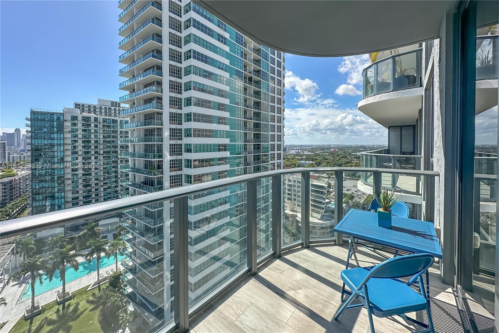 121 Northeast 34th Street, Unit 2003 Miami, FL 33137 - Photo 14 of 27 a view of a balcony with chairs