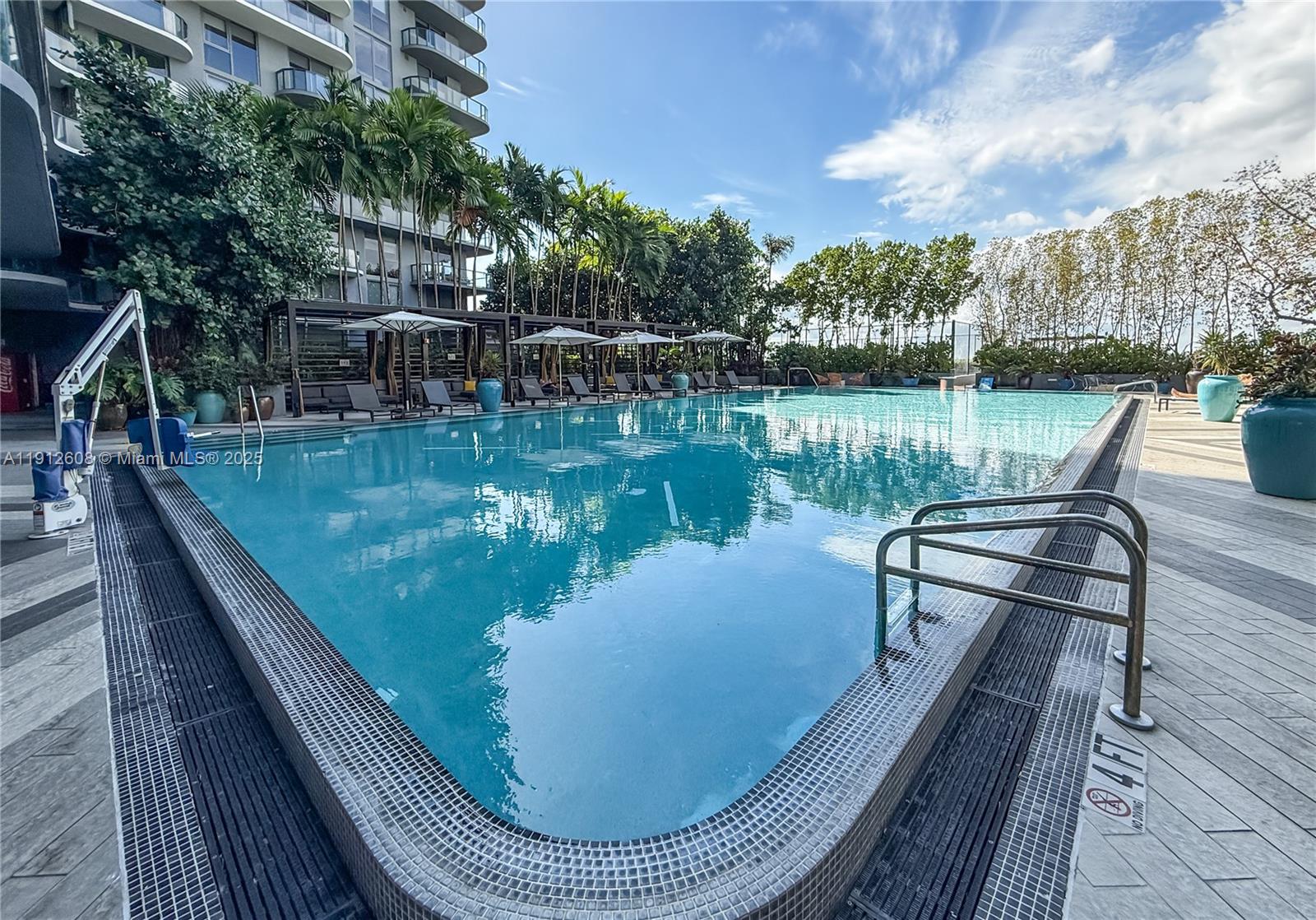 121 Northeast 34th Street, Unit 2003 Miami, FL 33137 - Photo 16 of 27 a view of a lake from a balcony