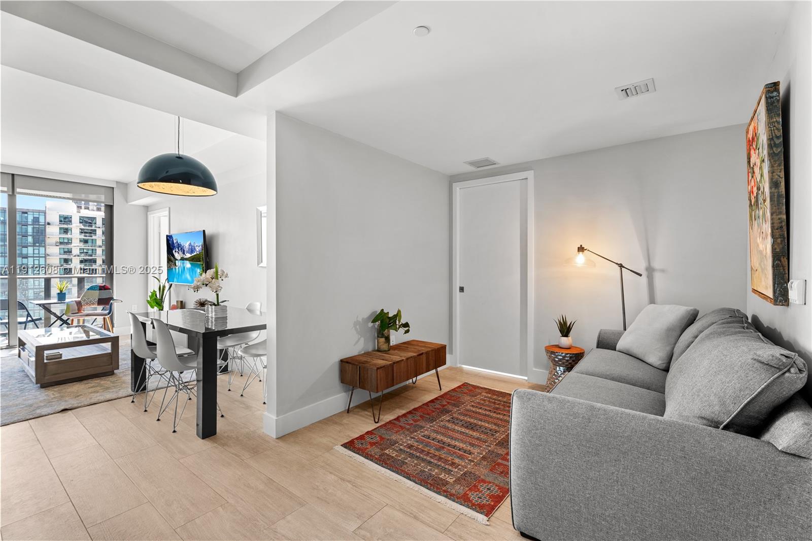 121 Northeast 34th Street, Unit 2003 Miami, FL 33137 - Photo 4 of 27 a living room with furniture