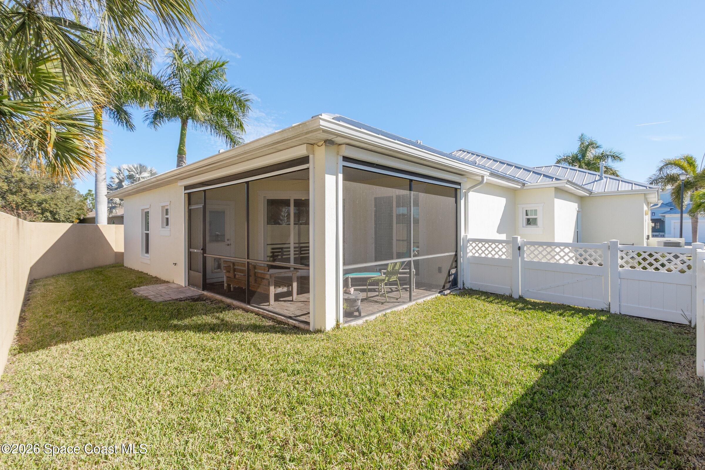 1399 Tullagee Avenue Melbourne, FL 32940 - Photo 34 of 53 a view of front door of house with yard