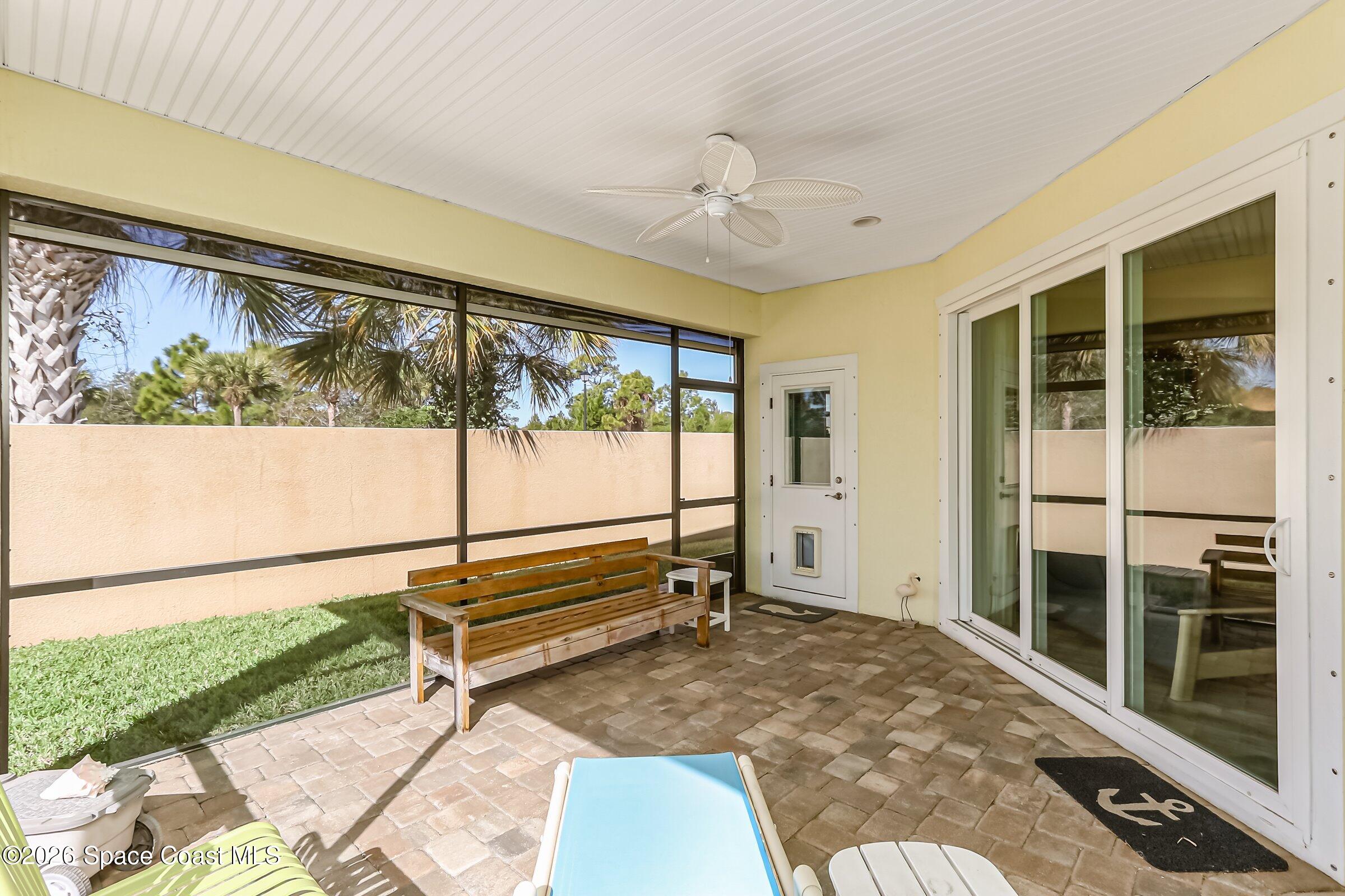 1399 Tullagee Avenue Melbourne, FL 32940 - Photo 36 of 53 a living room with a large window