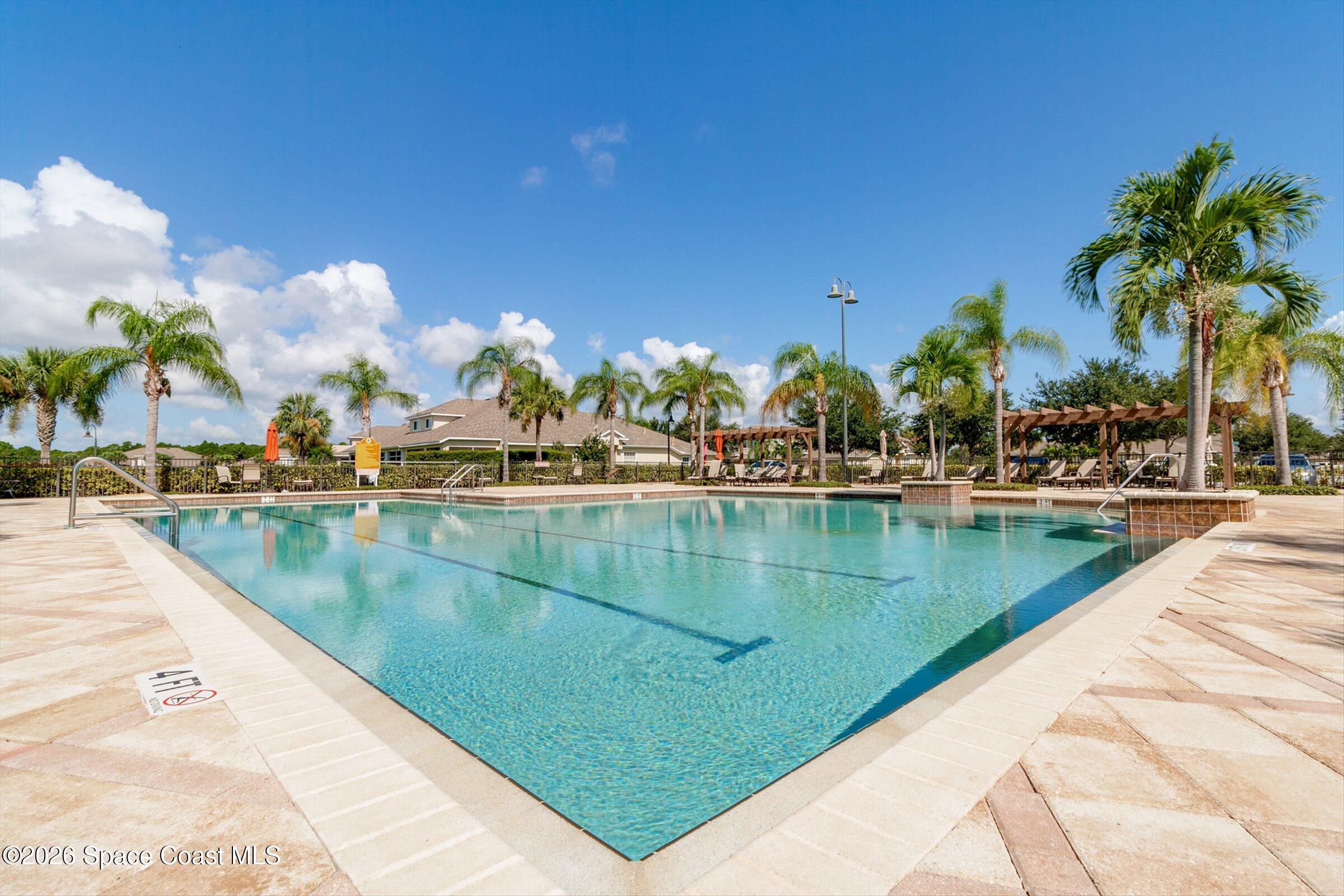 1399 Tullagee Avenue Melbourne, FL 32940 - Photo 41 of 53 a view of swimming pool with outdoor seating