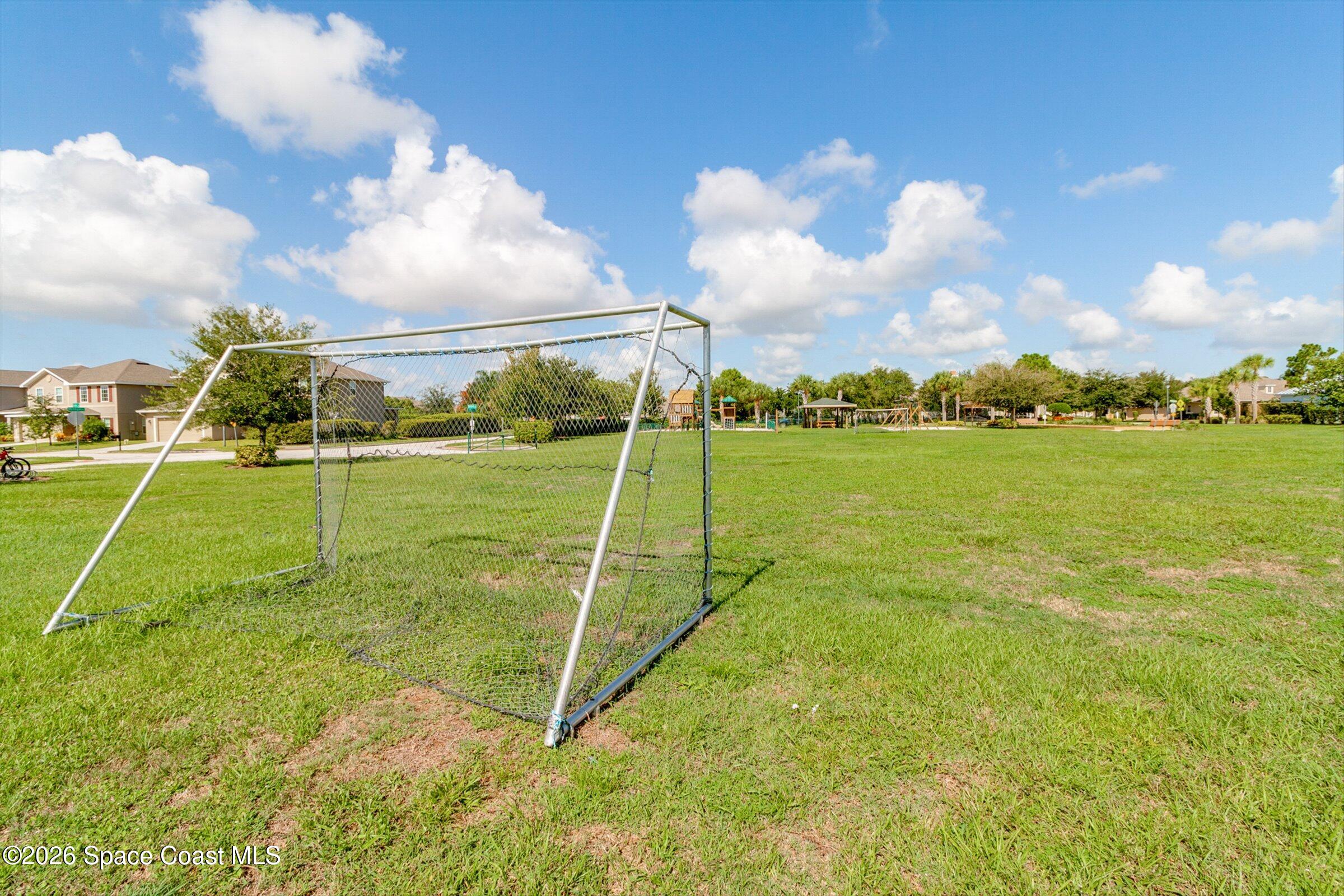1399 Tullagee Avenue Melbourne, FL 32940 - Photo 50 of 53 a view of a field with a big yard