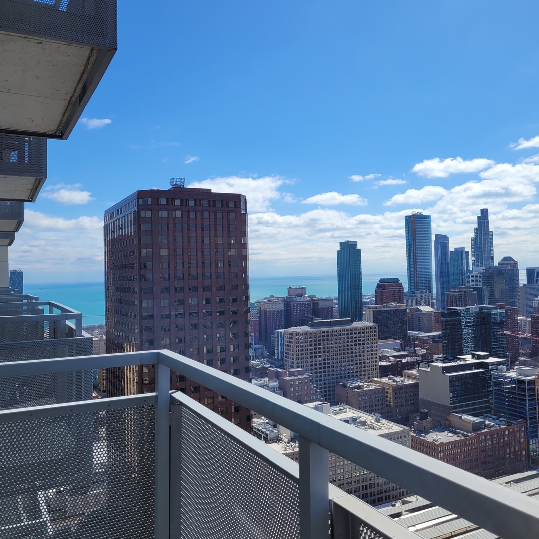 Undisclosed Address Chicago, IL 60607 - Photo 20 of 26 a terrace with a city view