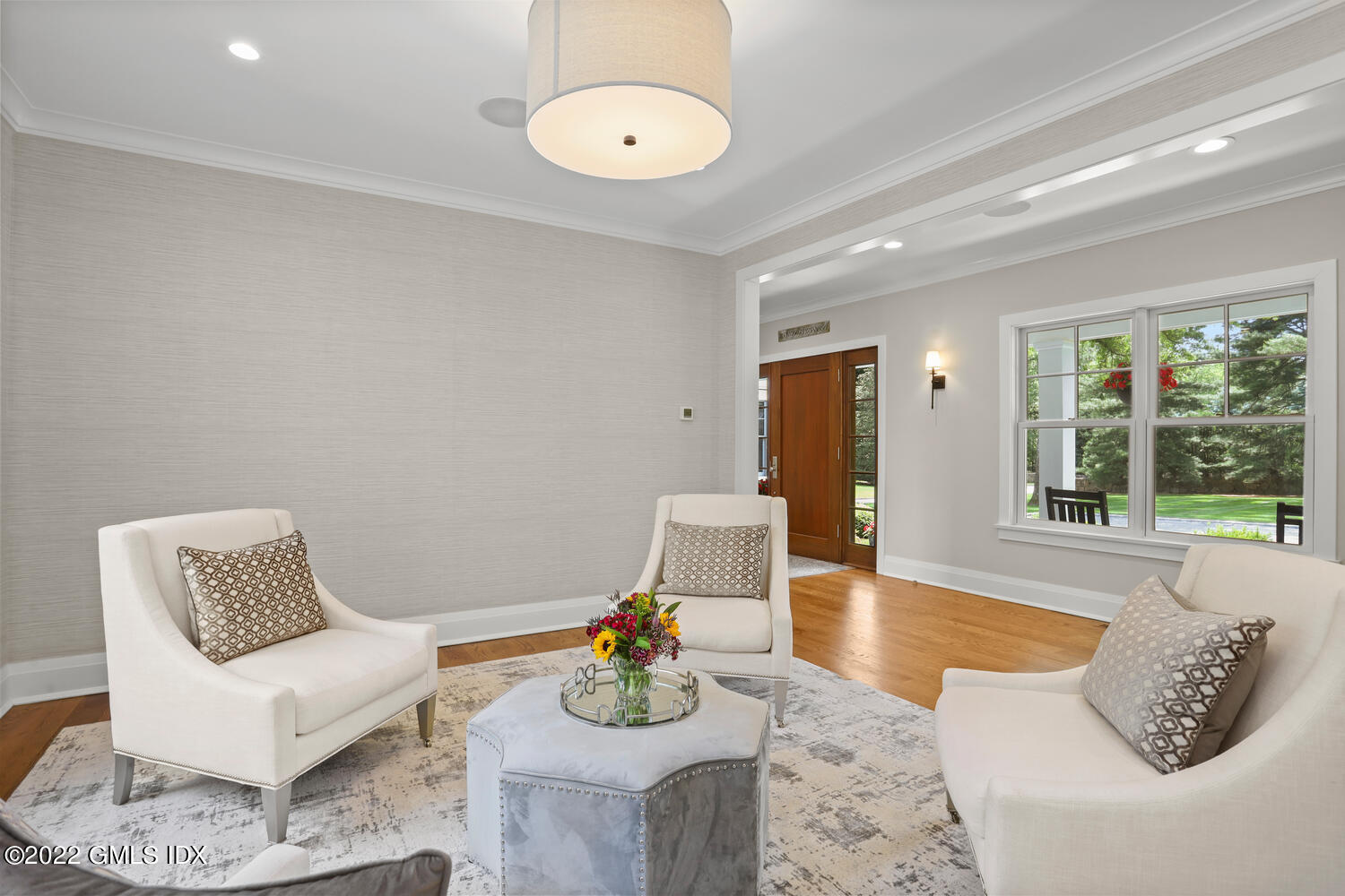 2 Loch Lane Greenwich, CT 06830 - Photo 11 of 64 a living room with furniture and a large window