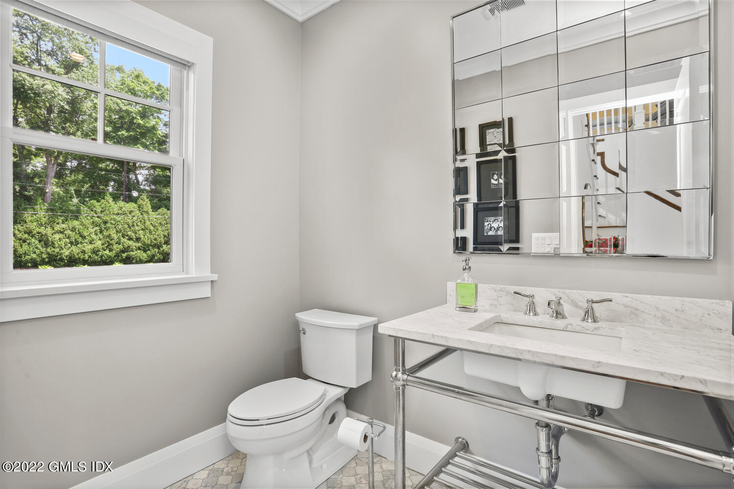 2 Loch Lane Greenwich, CT 06830 - Photo 23 of 64 a bathroom with a toilet sink and mirror