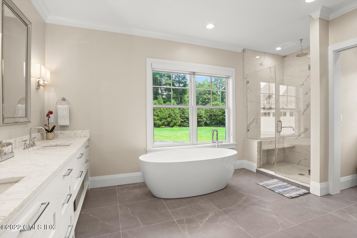 2 Loch Lane Greenwich, CT 06830 - Photo 31 of 64 a spacious bathroom with a bathtub sink and toilet