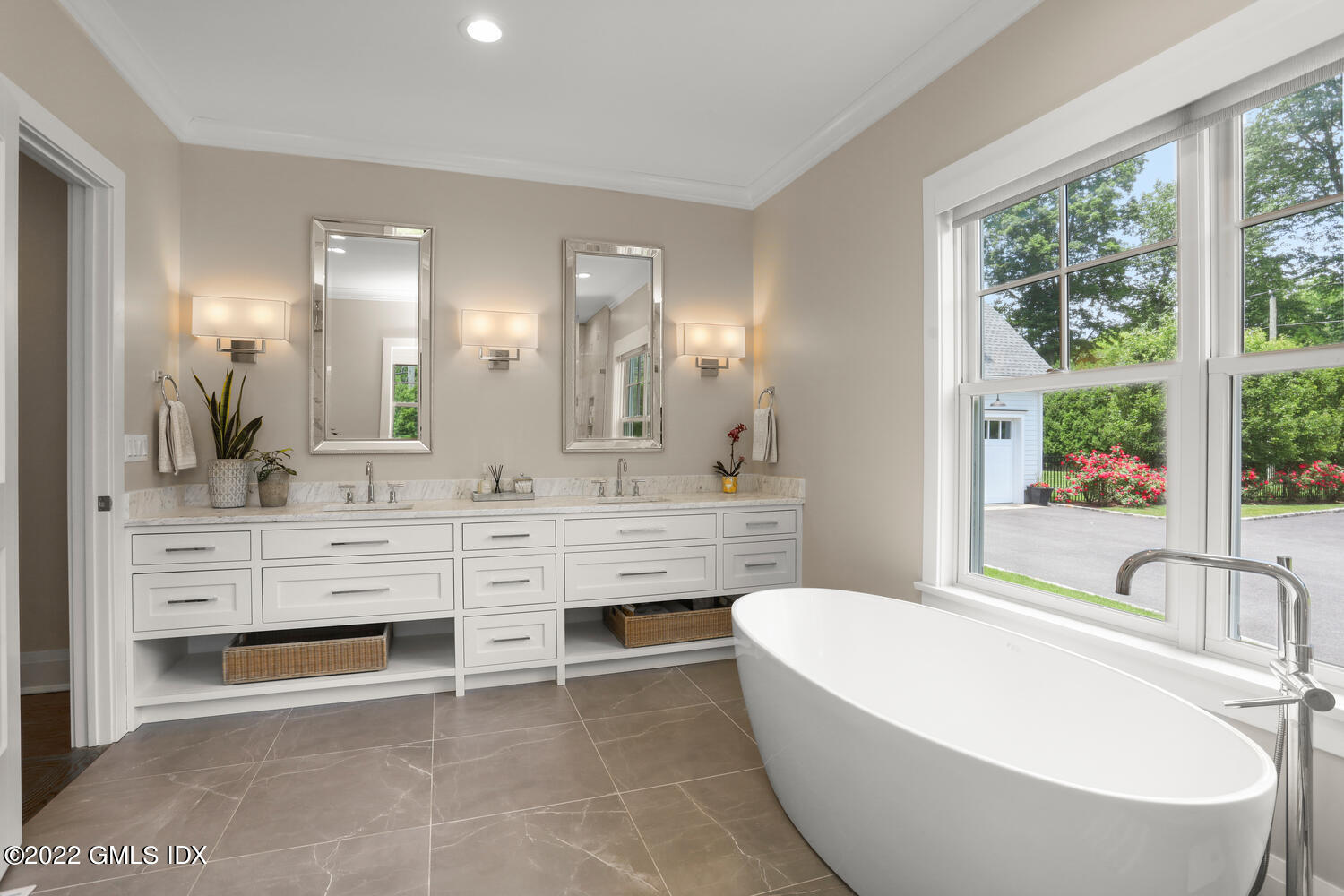 2 Loch Lane Greenwich, CT 06830 - Photo 32 of 64 a bathroom with a large tub sink and double vanity
