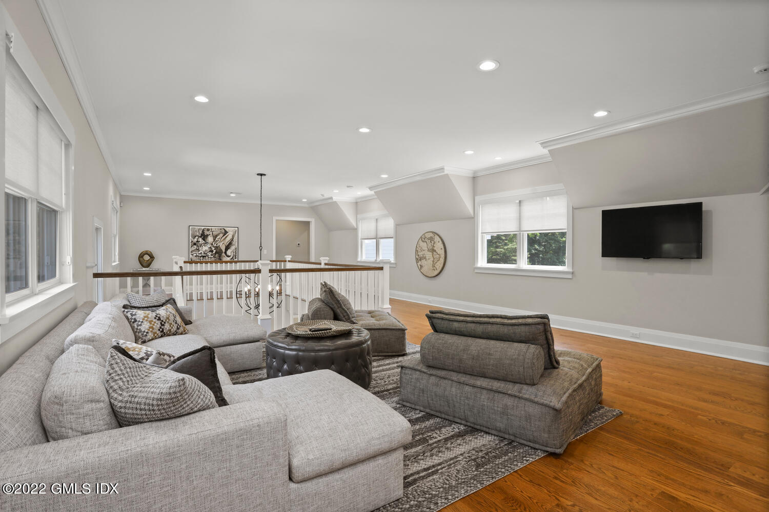 2 Loch Lane Greenwich, CT 06830 - Photo 34 of 64 a living room with furniture and a flat screen tv