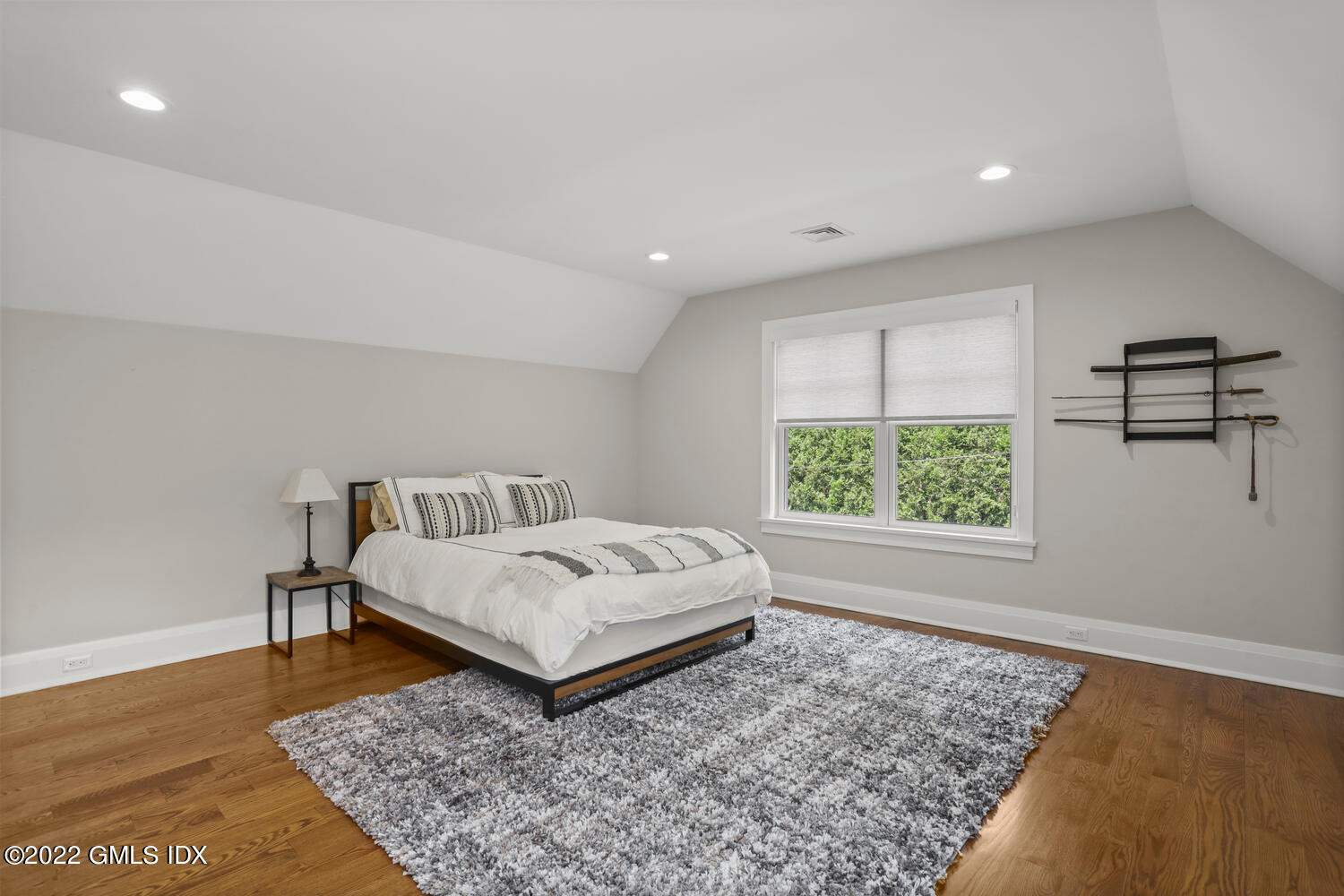 2 Loch Lane Greenwich, CT 06830 - Photo 41 of 64 a bed sitting in a spacious bedroom next to a window