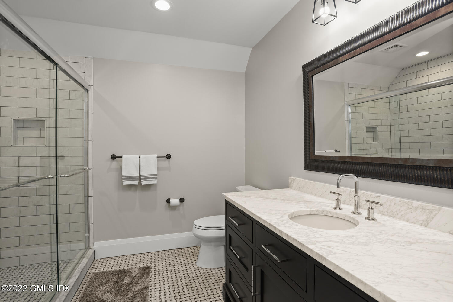 2 Loch Lane Greenwich, CT 06830 - Photo 44 of 64 a bathroom with a sink a toilet and shower