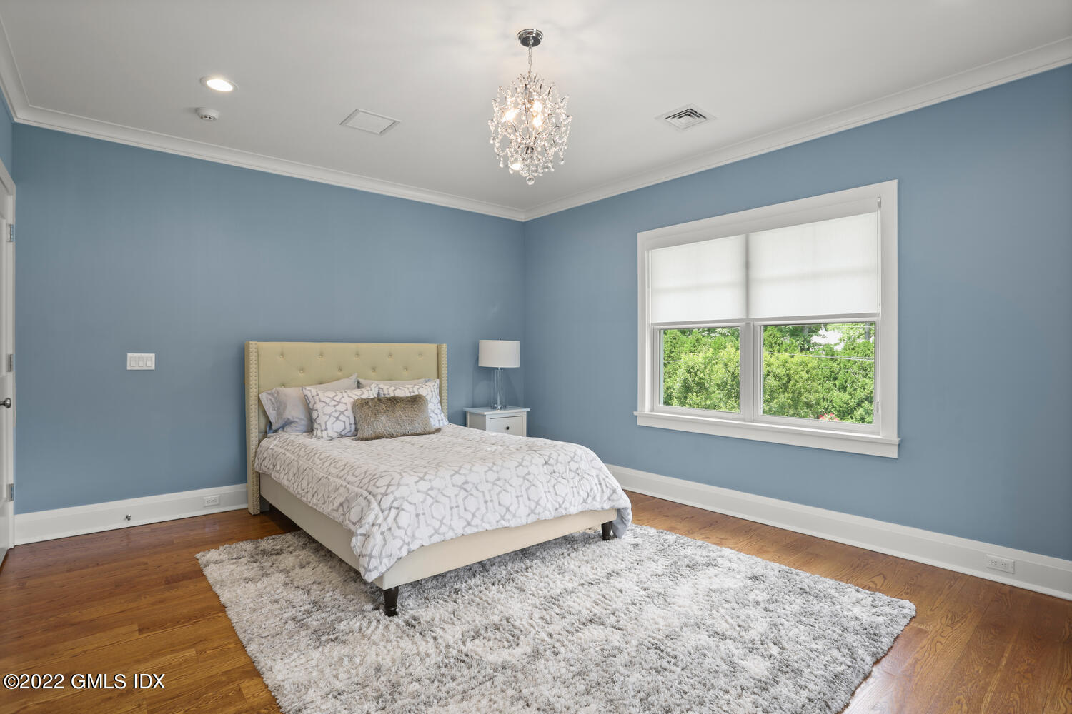 2 Loch Lane Greenwich, CT 06830 - Photo 46 of 64 a bedroom with a large bed and a window