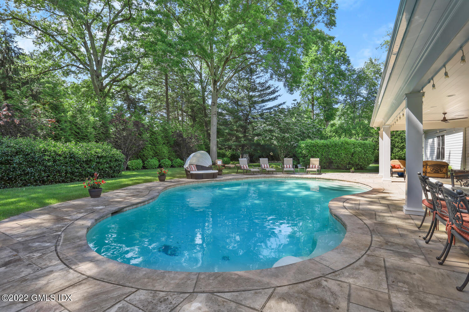2 Loch Lane Greenwich, CT 06830 - Photo 54 of 64 a view of a swimming pool with a patio