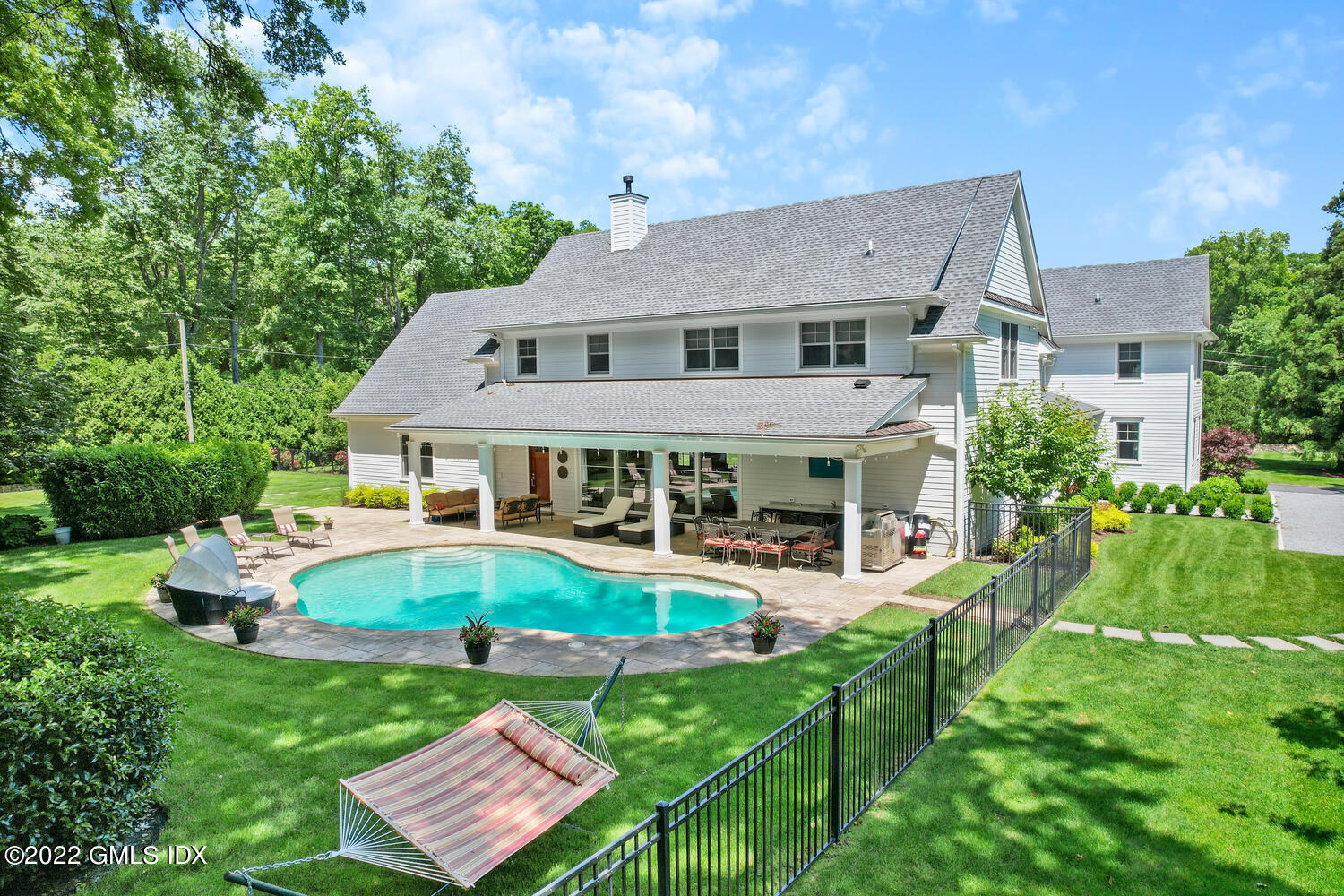 2 Loch Lane Greenwich, CT 06830 - Photo 57 of 64 a aerial view of a house with swimming pool and garden