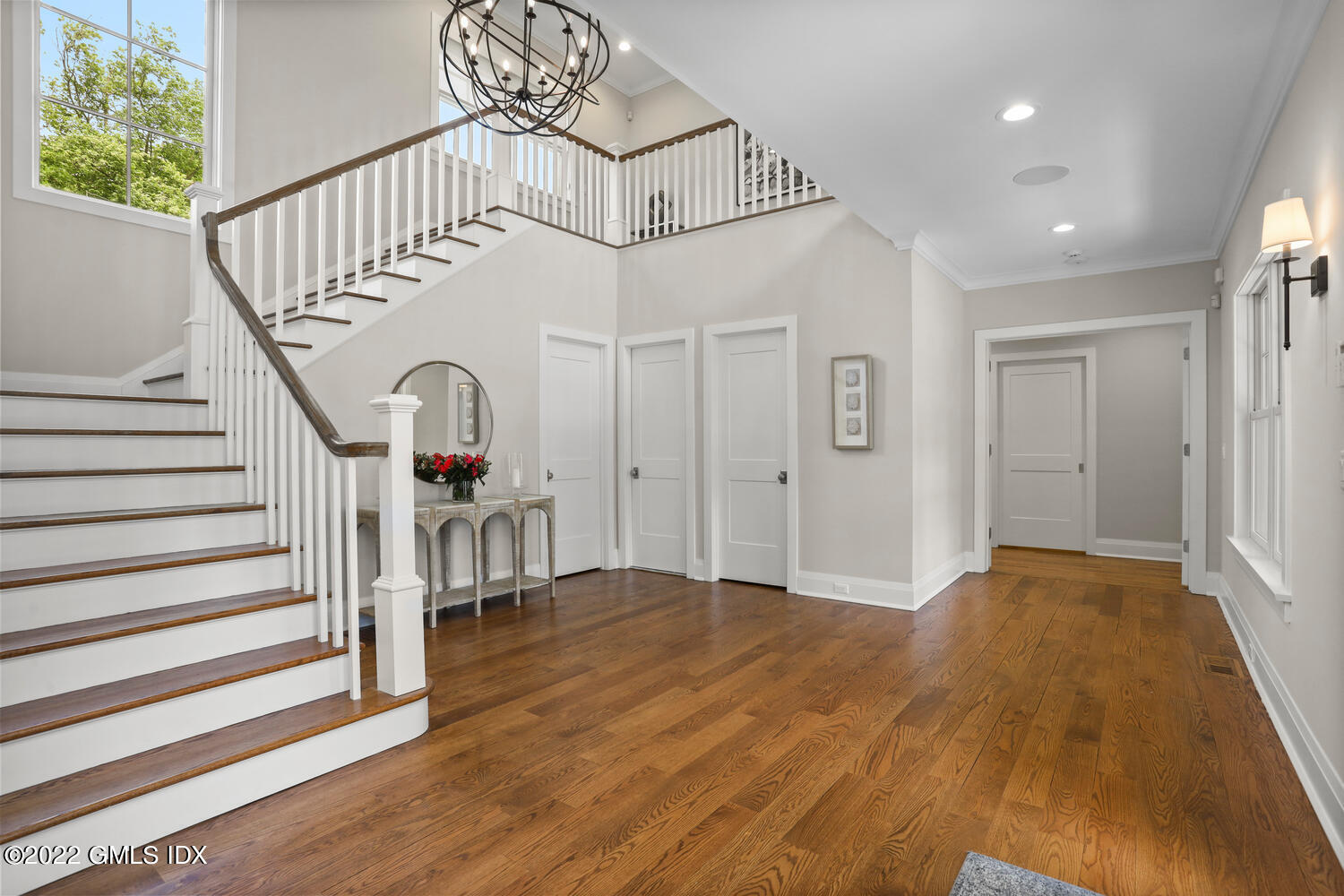 2 Loch Lane Greenwich, CT 06830 - Photo 9 of 64 a view of entryway and hall with wooden floor