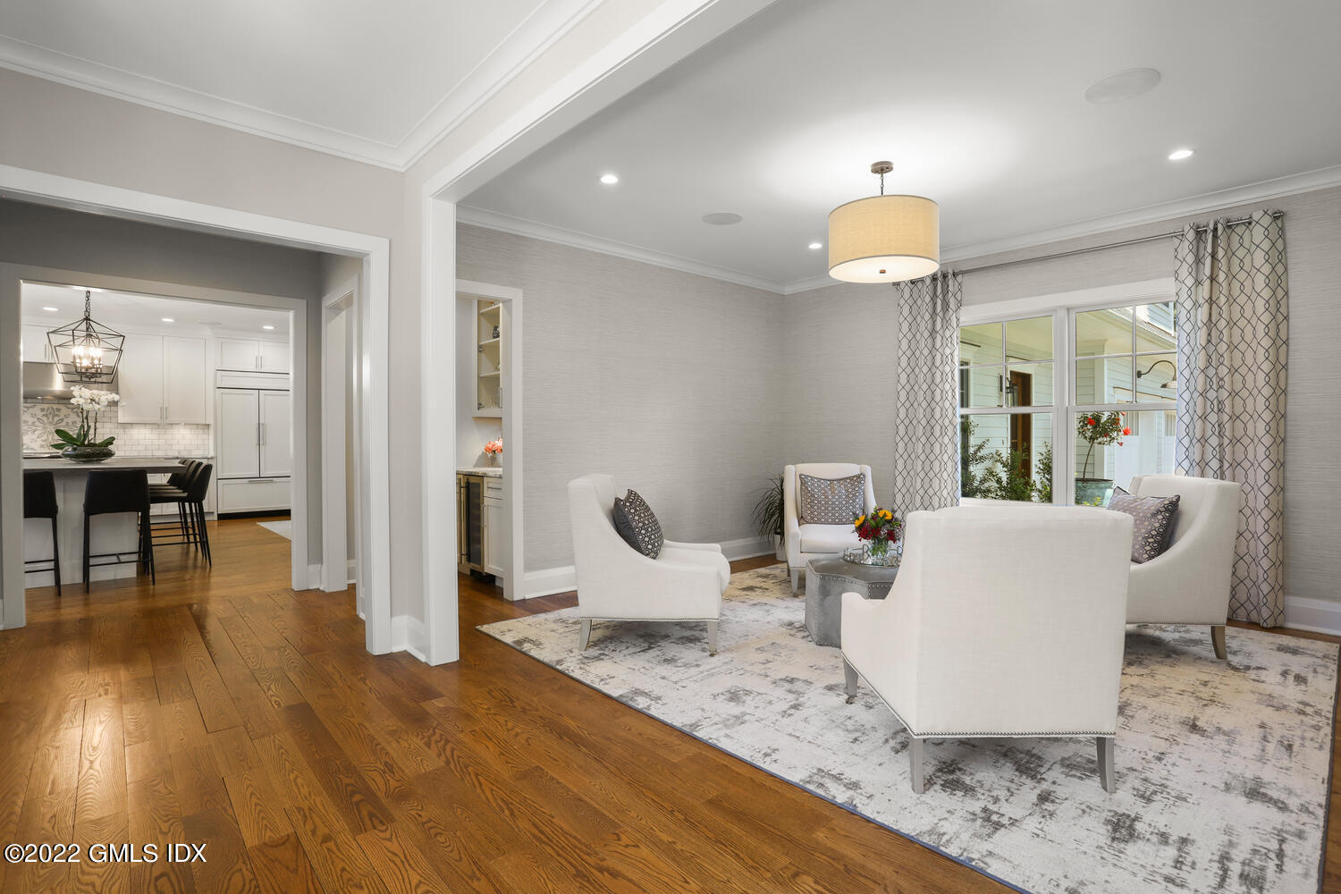 2 Loch Lane Greenwich, CT 06830 - Photo 10 of 64 a living room with furniture and a wooden floor
