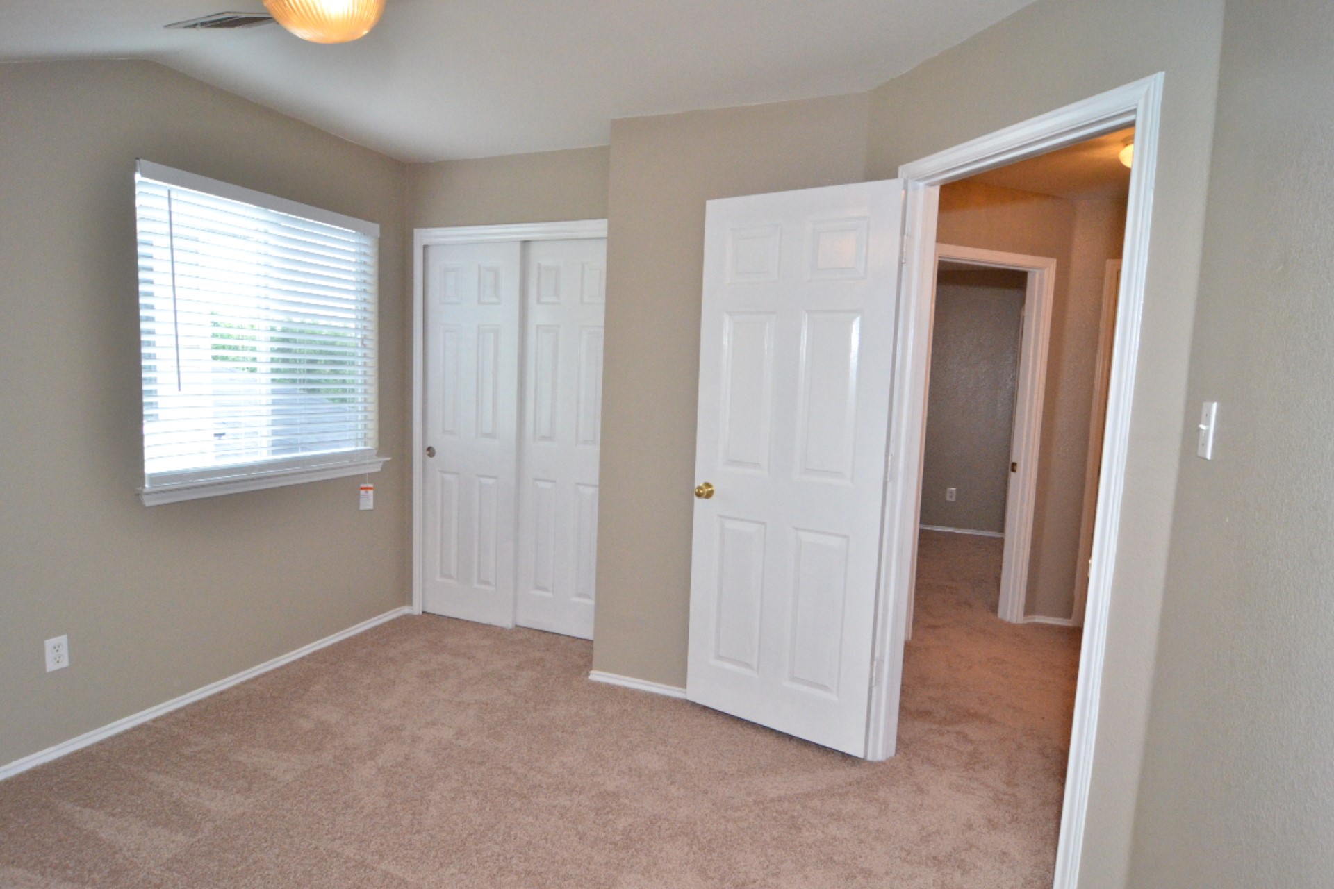 316 Strawn Kyle, TX 78640 - Photo 25 of 34 a view of an empty room with closet and a window