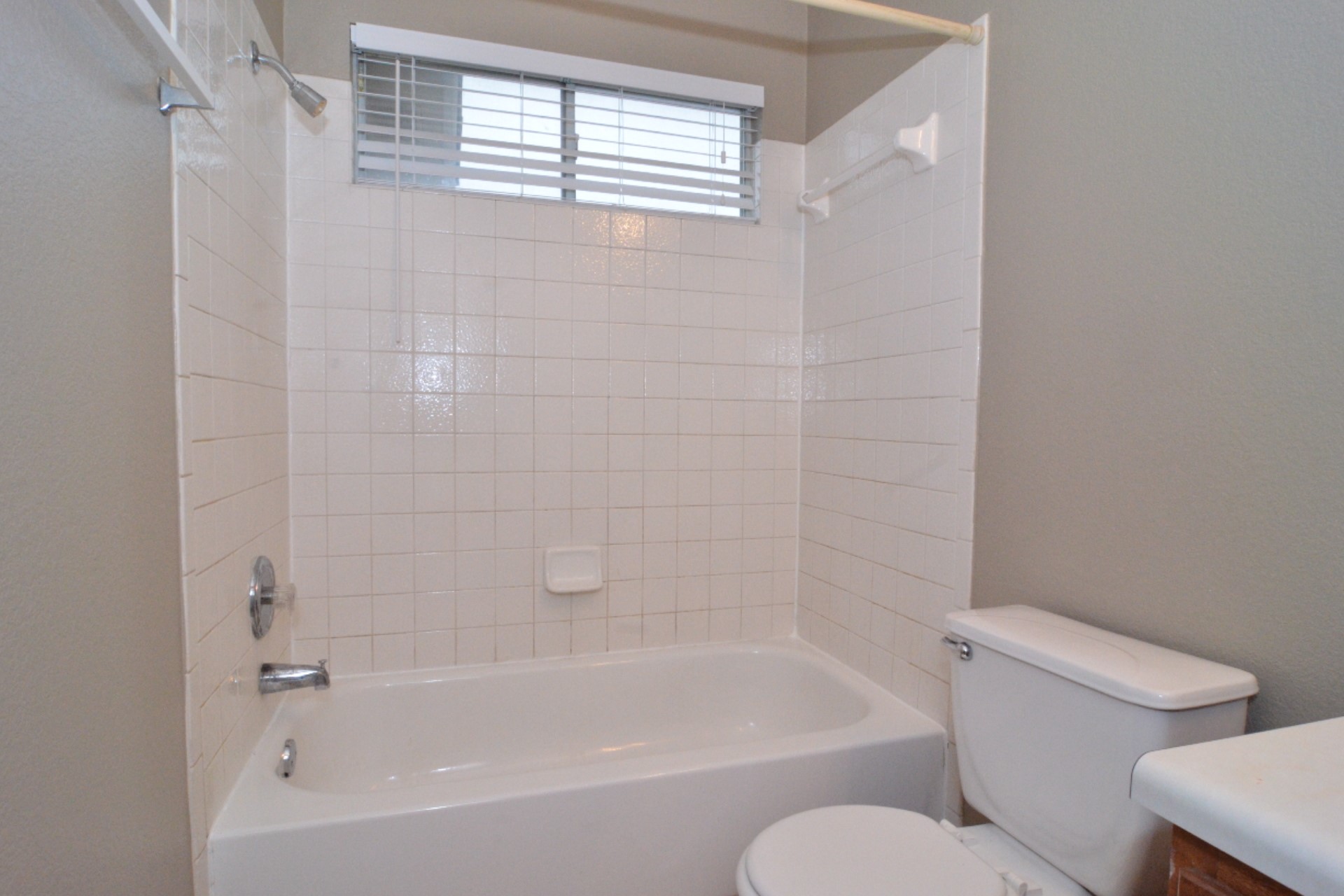 316 Strawn Kyle, TX 78640 - Photo 27 of 34 a white bath tub sitting next to a white toilet