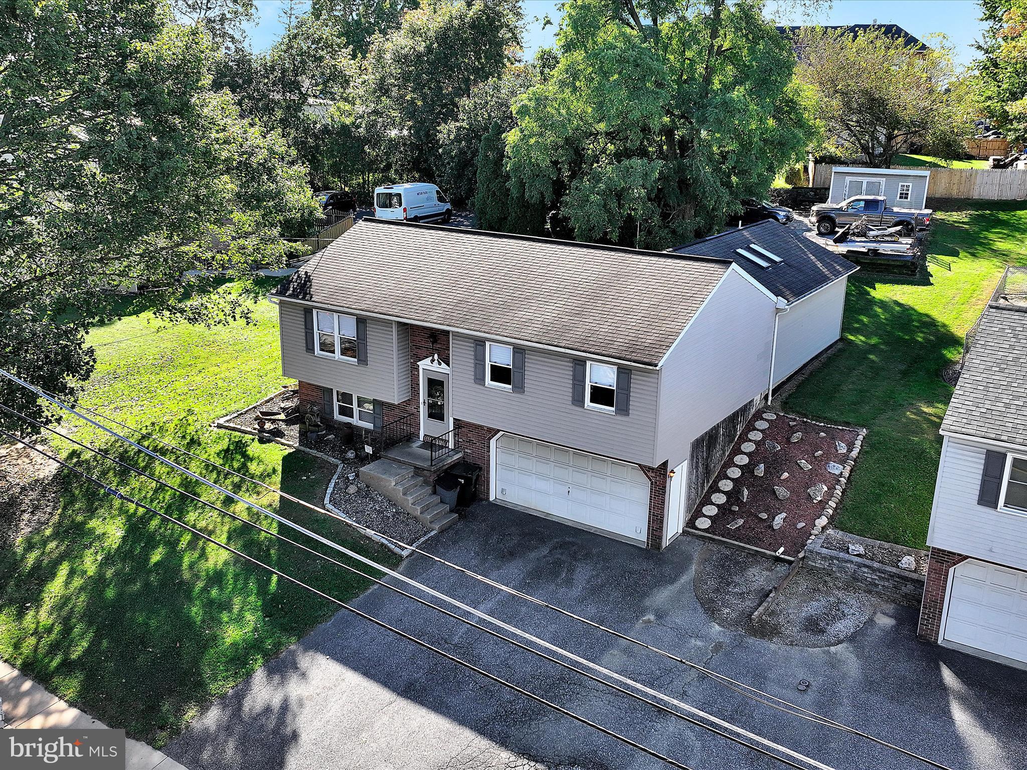 2032 Main Street Lititz, PA 17543 - Photo 1 of 32 an aerial view of a house with garden space and street view