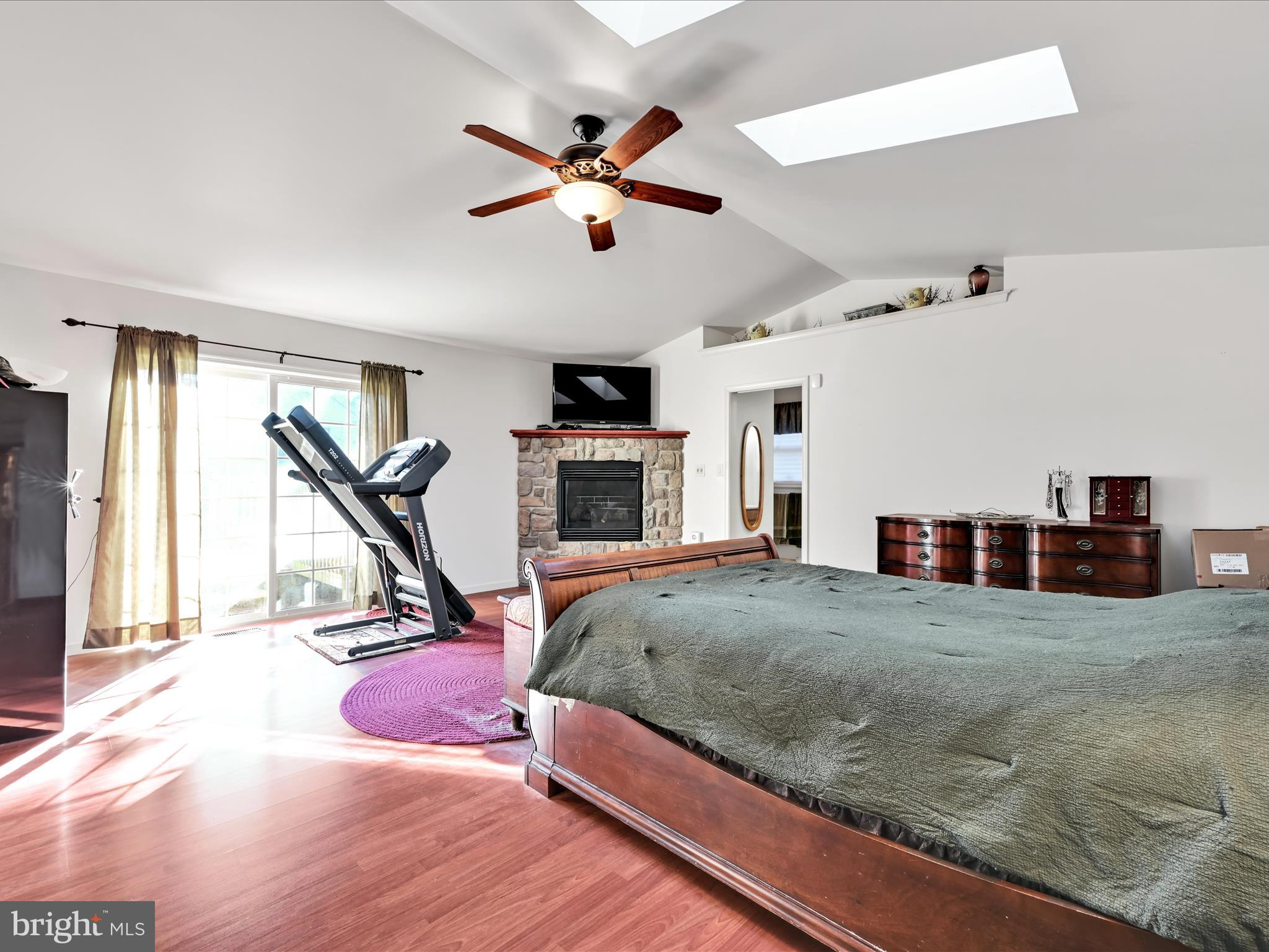 2032 Main Street Lititz, PA 17543 - Photo 11 of 32 a bed room with a bed and a flat screen tv